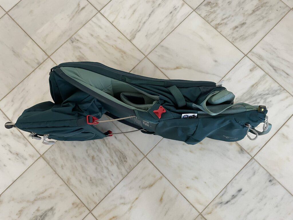 High-up shot of folded Osprey Poco LT showing how compact it can be. 