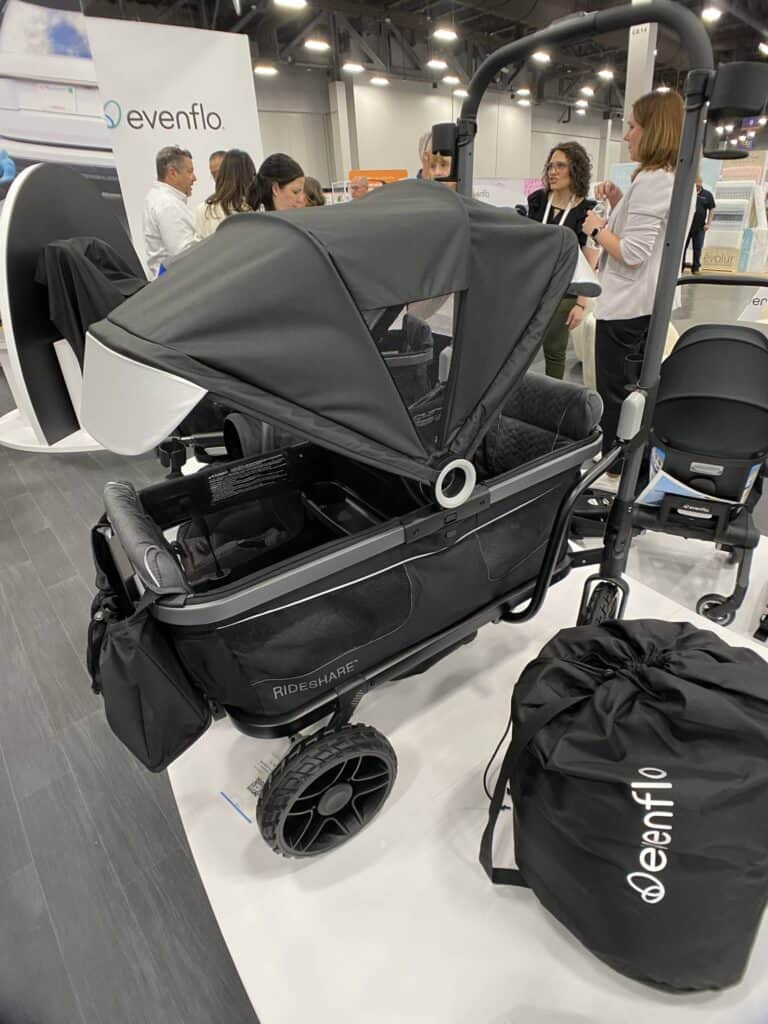 Evenflo Shyft Rideshare with black color canopy and a storage bag