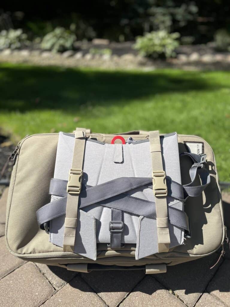 Outside buckle straps for No Reception Club's Duffel bag