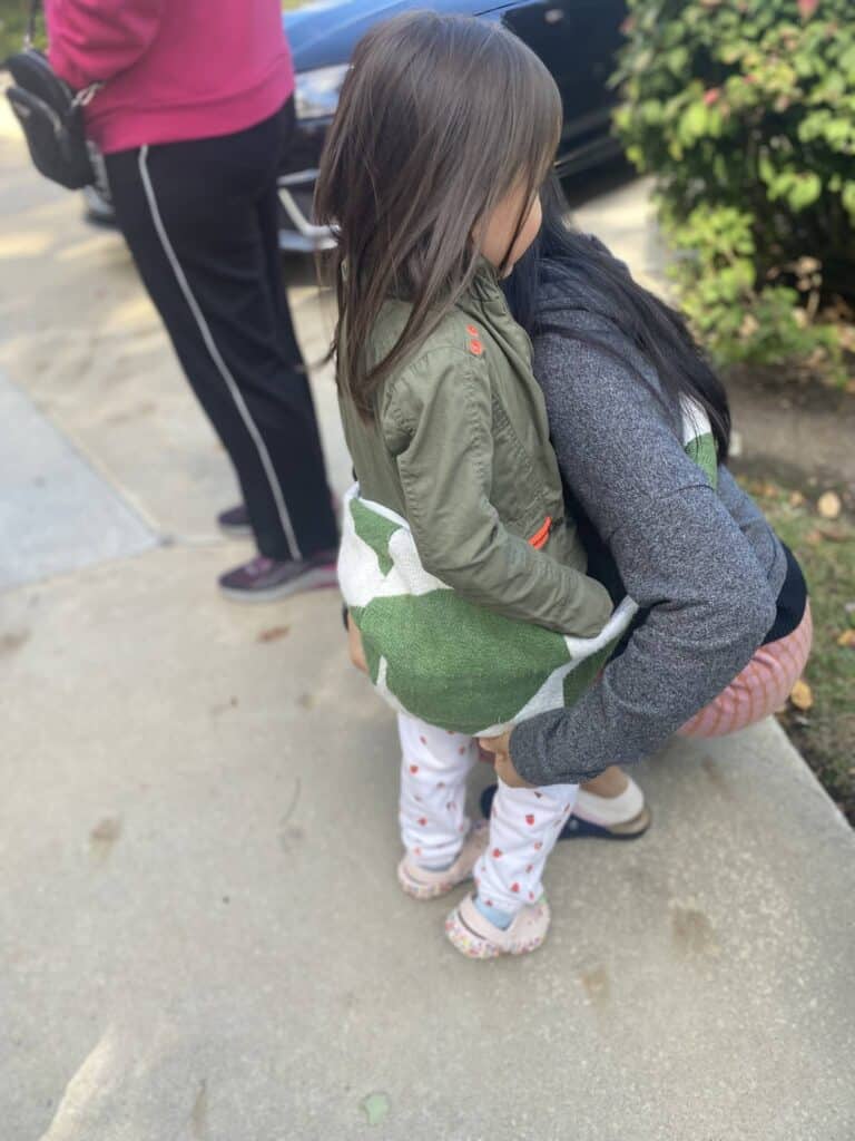 Easy to scoop toddler in with wild ride toddler sling